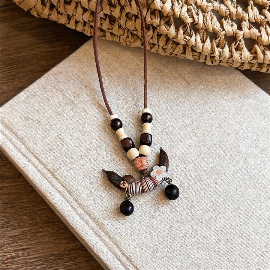 Bohemian Ceramic Bell and Wooden Pendant Necklace - view 7