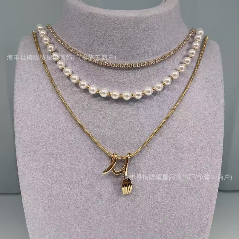 HEFANG何方卷卷叉子三层链轻奢优雅百搭珍珠项链女