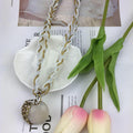 EU/US Import Hot Sale Handmade Beige Bead Bohemian Ethnic Retro Sweater Chain Hole Peacock Gem Pendant Necklace