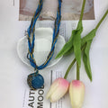 EU/US Import Hot Sale Handmade Beige Bead Bohemian Ethnic Retro Sweater Chain Hole Peacock Gem Pendant Necklace