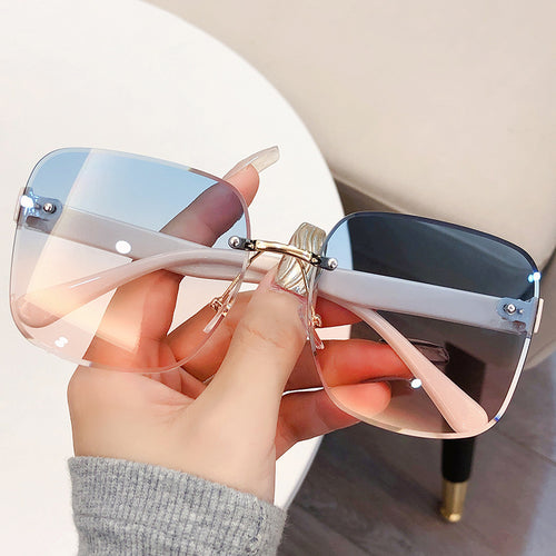 New Overseas Rimless Beveled Women Ocean Lens Sunglasses Fashionable Big Frame Sunshade UV-Proof Sunglasses Wholesale