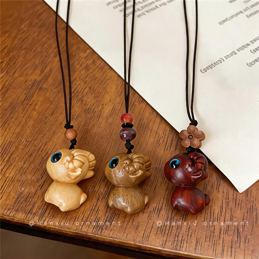 Chinese-Inspired Wooden Flower and Ceramic Sheep Pendant Necklace - view 2