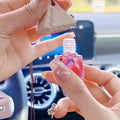 车载香水香薰吊坠汽车挂饰持久淡香精油车内挂件悬挂式玻璃瓶木盖