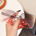 New Overseas Rimless Beveled Women Ocean Lens Sunglasses Fashionable Big Frame Sunshade UV-Proof Sunglasses Wholesale