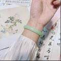 新疆复古仿玉圆条手镯古风藕粉色美人条手镯少女小红书同款手饰