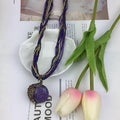 EU/US Import Hot Sale Handmade Beige Bead Bohemian Ethnic Retro Sweater Chain Hole Peacock Gem Pendant Necklace