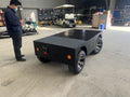 Driverless wire-controlled chassis Driverless remote control electric four-wheel vehicle chassis Parade float chassis production