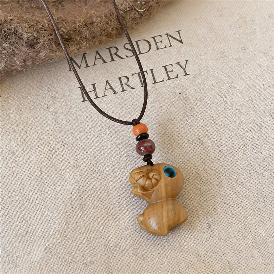 Chinese-Inspired Wooden Flower and Ceramic Sheep Pendant Necklace - view 7