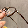 Korean Style Artsy Oval Round F9510ZM Book Nerd Frame Fashionable Cat-Eye Glasses Frame Women Cinnabar Sun Glasses Wholesale