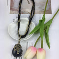 Western Retro Bohemian Ethnic Teardrop Cutout Flower Pendant Necklace Fashionable Personality Woven Sweater Chain