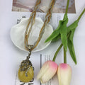Western Retro Bohemian Ethnic Teardrop Cutout Flower Pendant Necklace Fashionable Personality Woven Sweater Chain